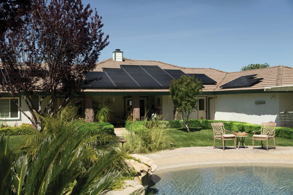 black-solar-panels-on-brown-roof